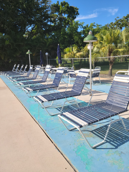 Pool lounge chairs looking to old golf course.jpg